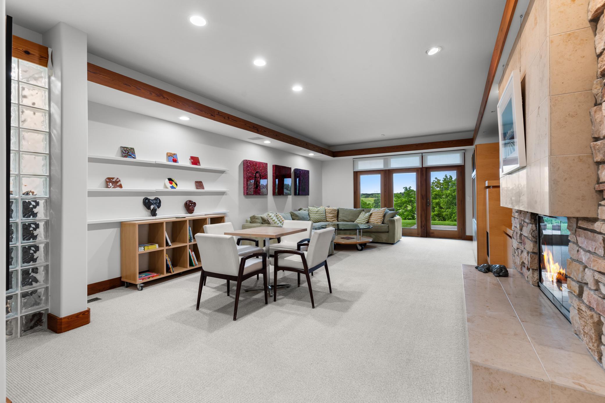 A large family room with generous spaces in the lower level