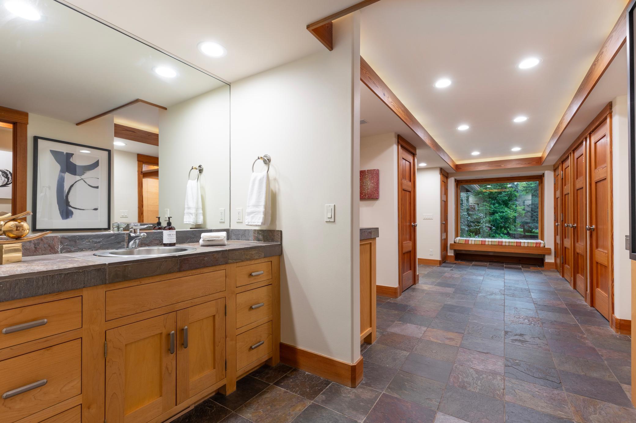 Back hallway has tiled floors for easy living and southern natural light