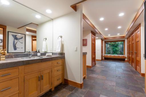 Back hallway has tiled floors for easy living and southern natural light