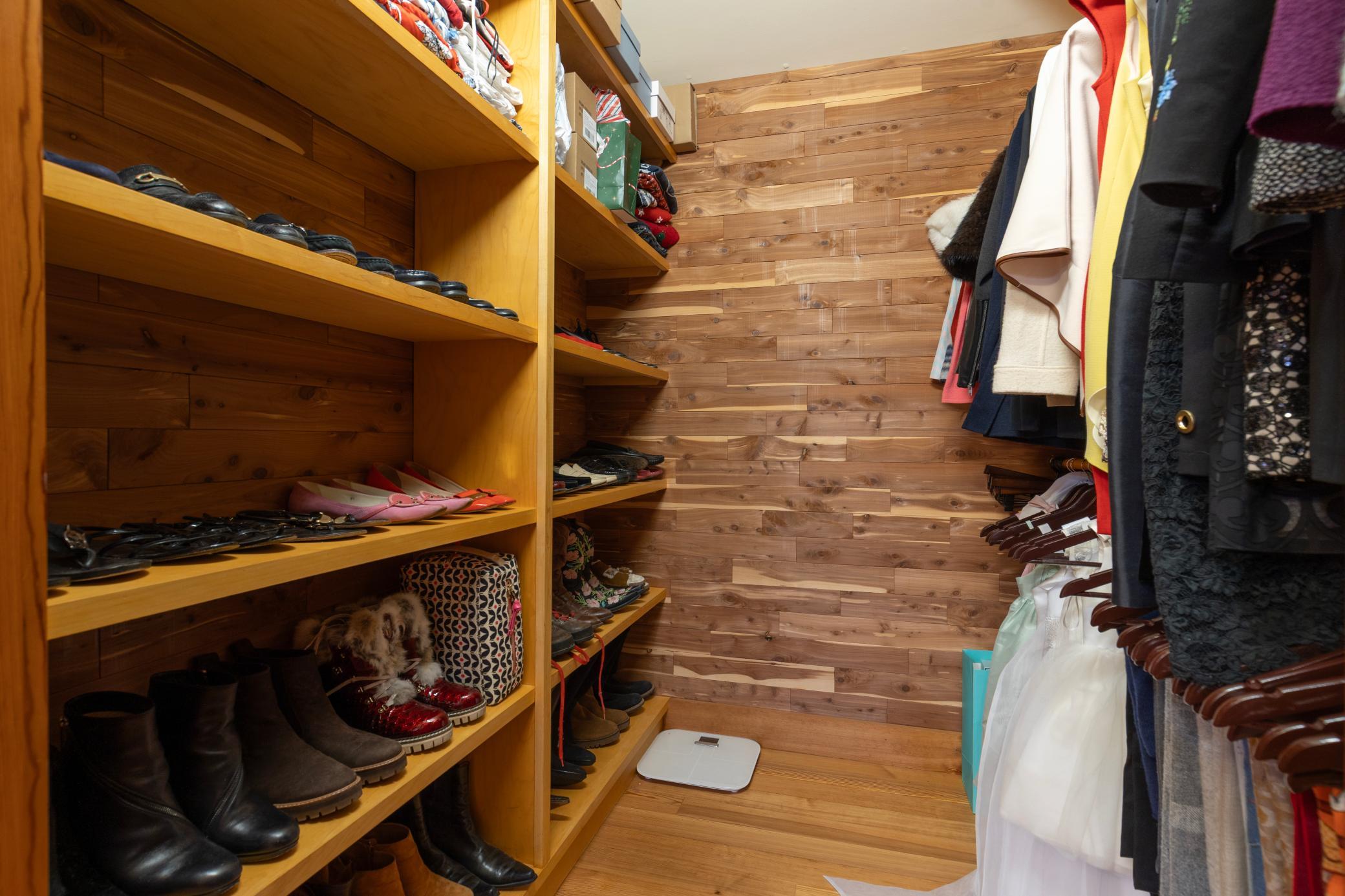 Cedar closets extend from the primary closet