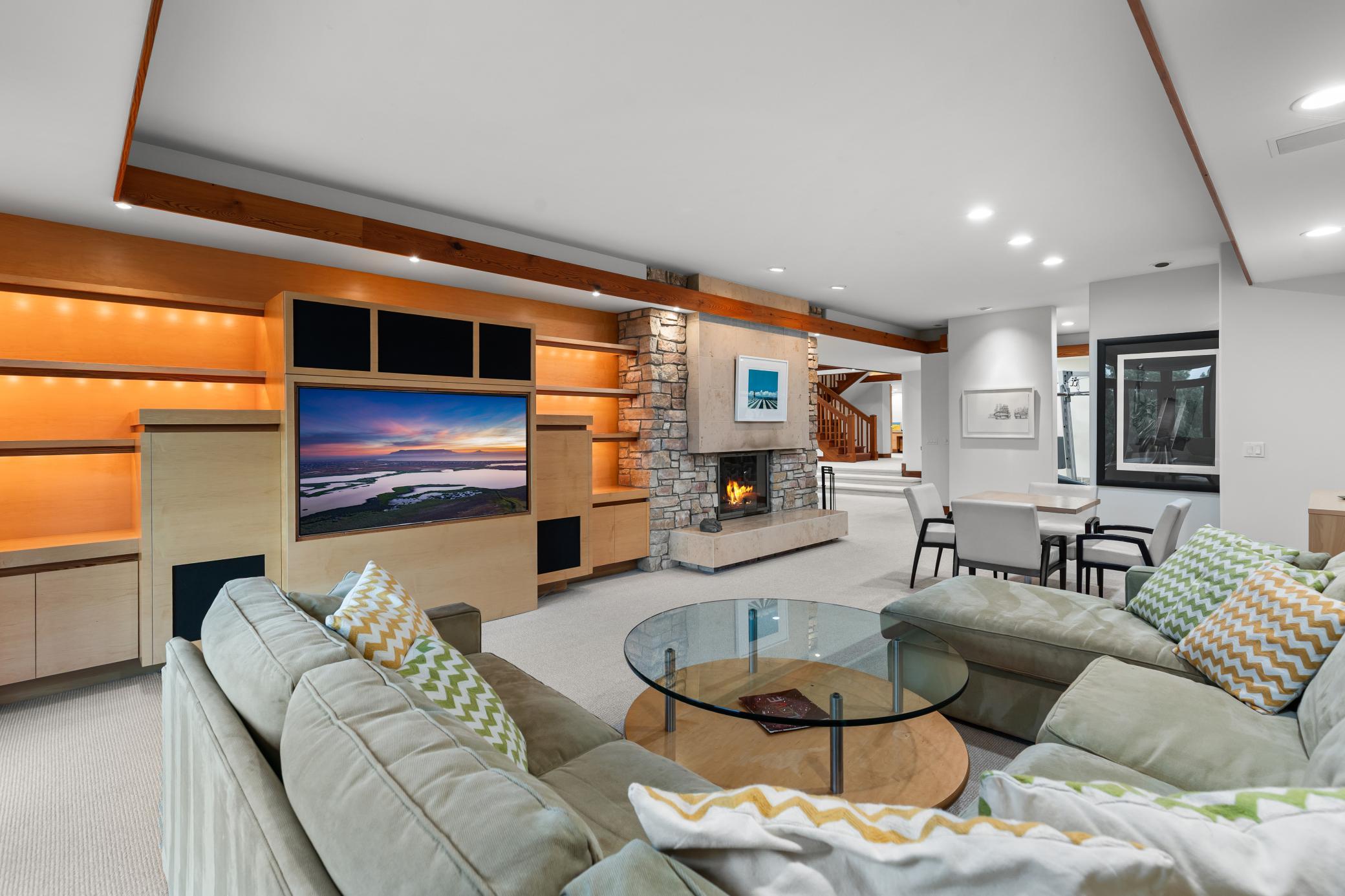 Built-in shelving and cabinetry for easy entertaining/media viewing