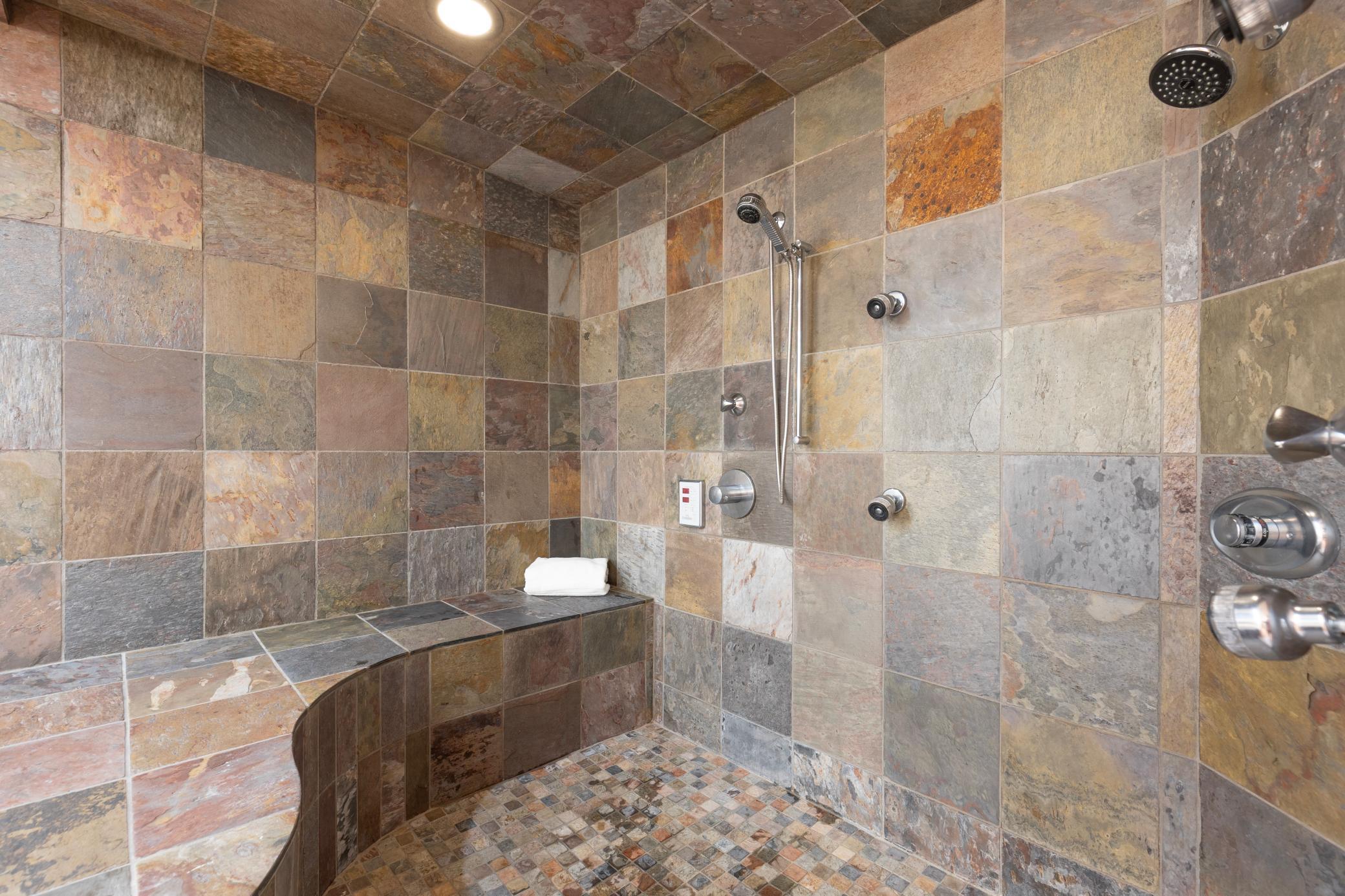 Stone tiled primary shower