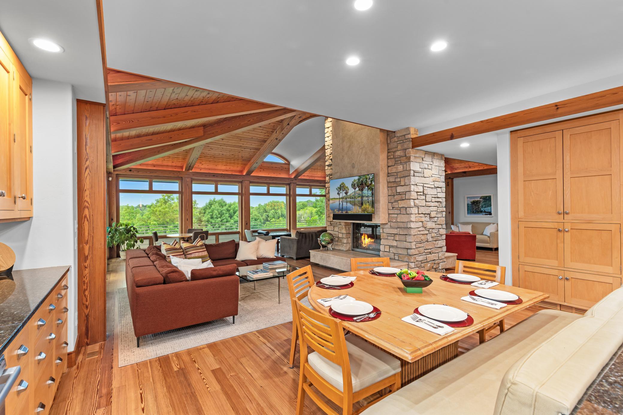 Open views from the kitchen to the family room and ultimately expansive vistas of Baker Park