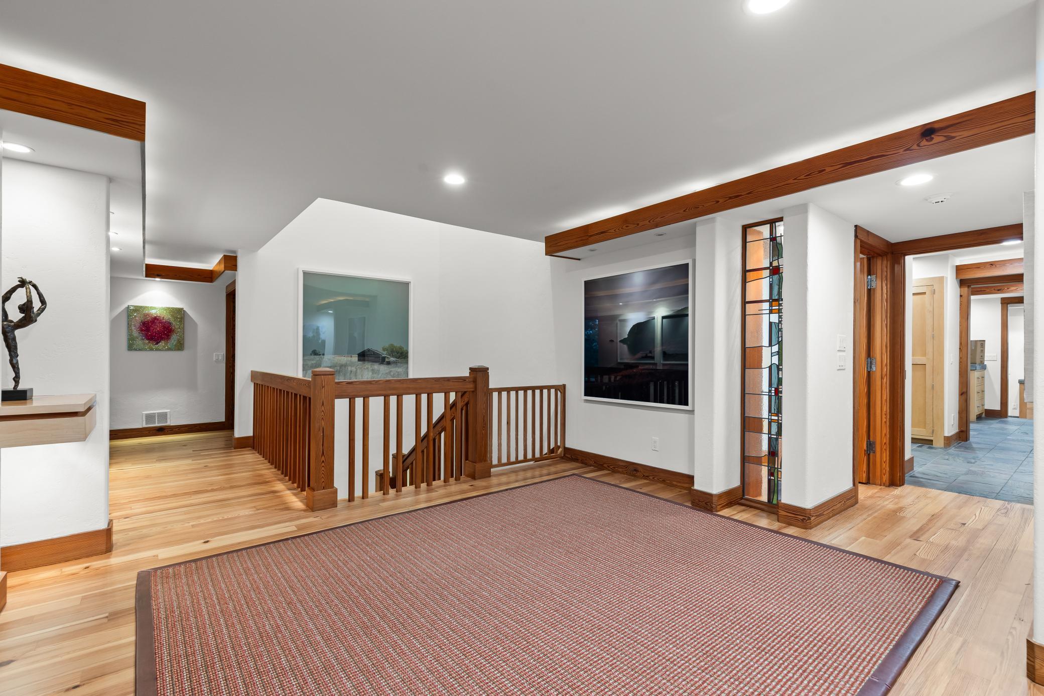 Douglas fir beams add warmth, dimension, and a sense of purpose throughout