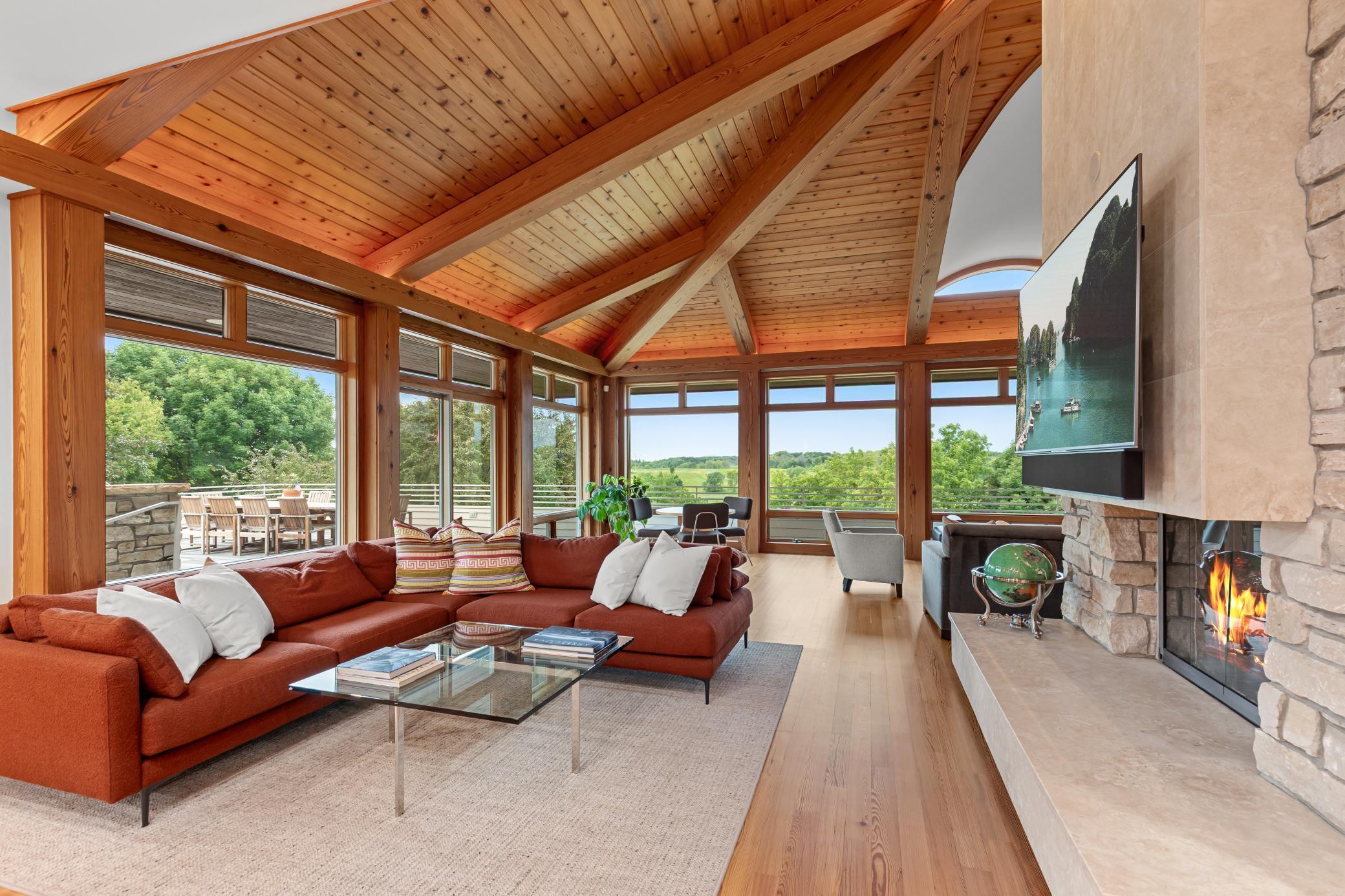 Knotty pine tongue-and groove ceilings are complimented by soft surround lighting and sky light