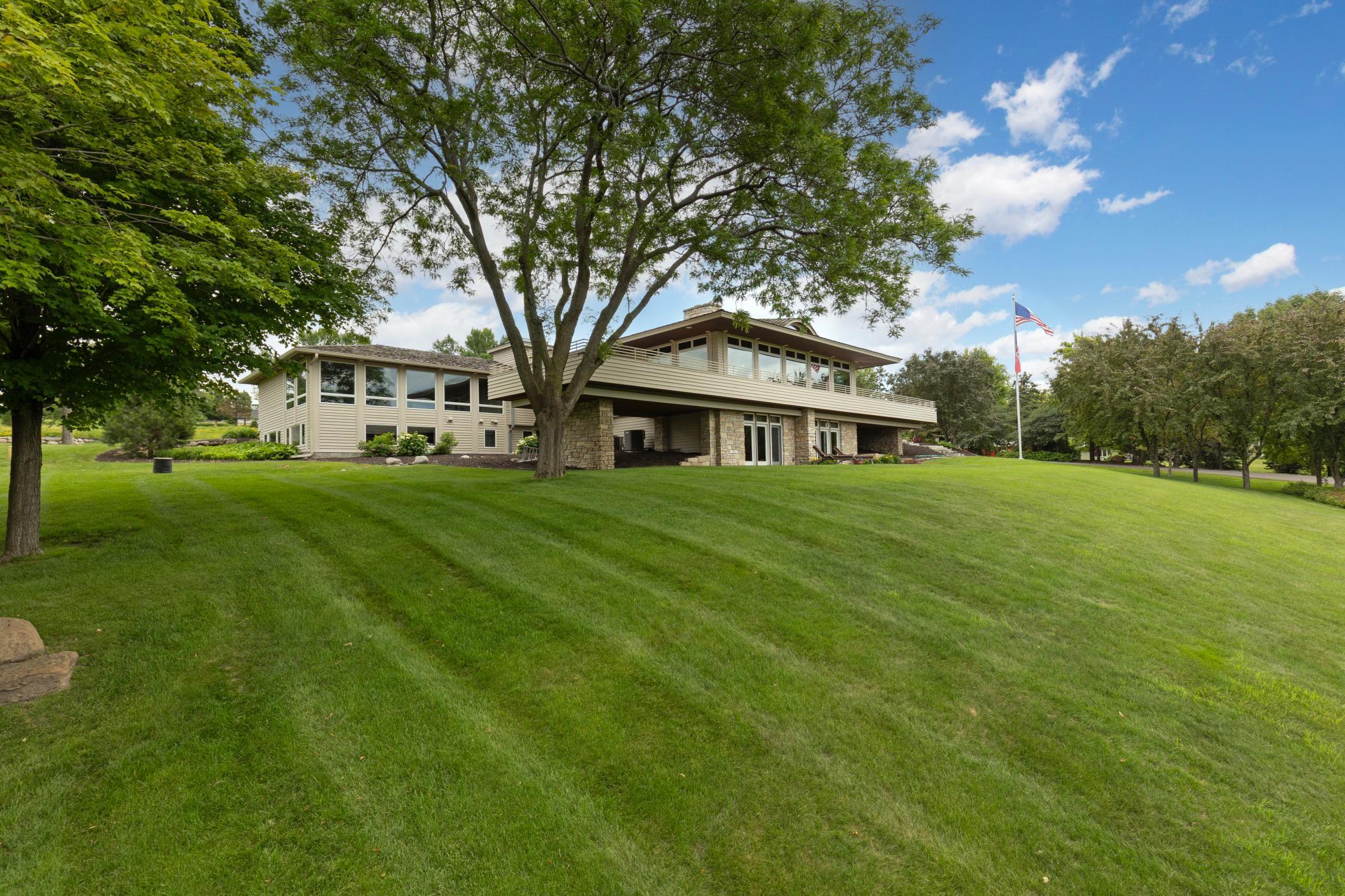 Welcome to this signature estate built by Streeter, set atop a commanding five acre homesite overlooking Baker Park