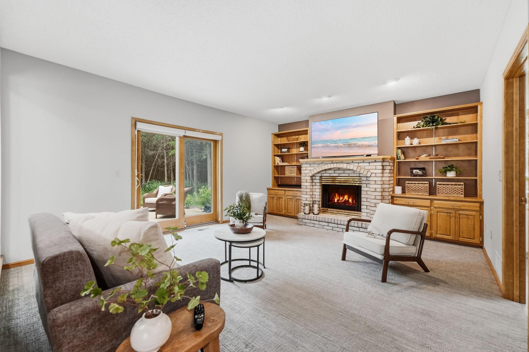 Main level living room walks out to your patio and deck.