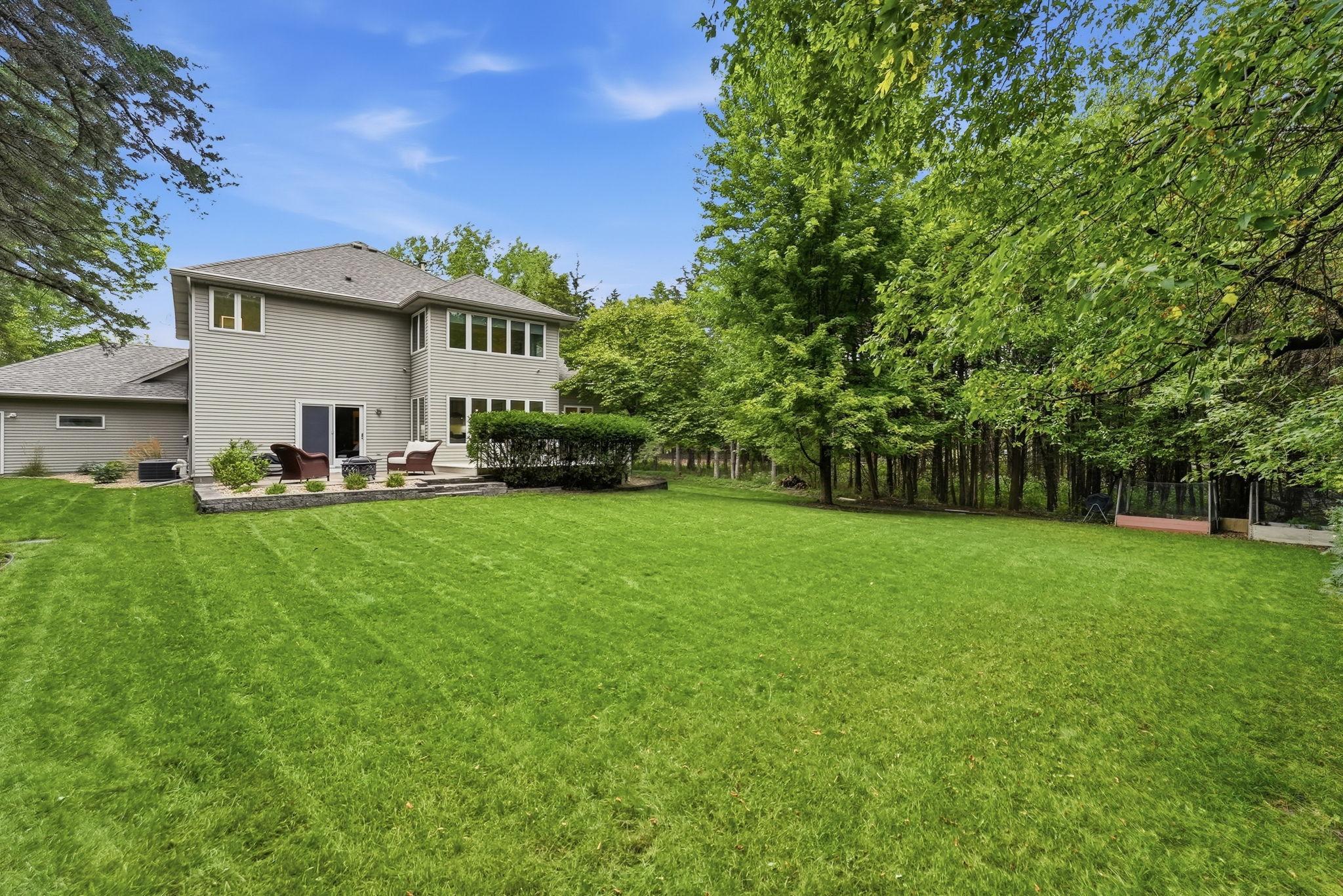 Backyard awaits playing, gardening and more!