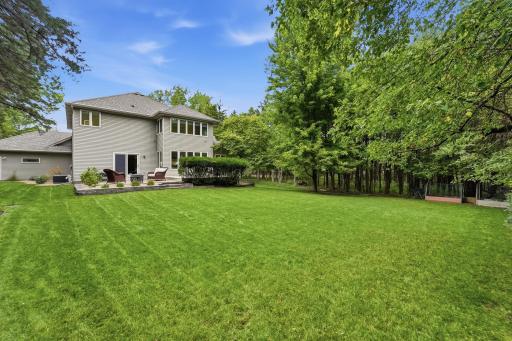 Backyard awaits playing, gardening and more!