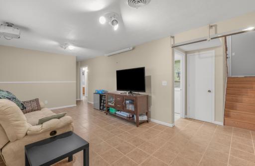 What a great space for a family room, gaming area, office or flex area