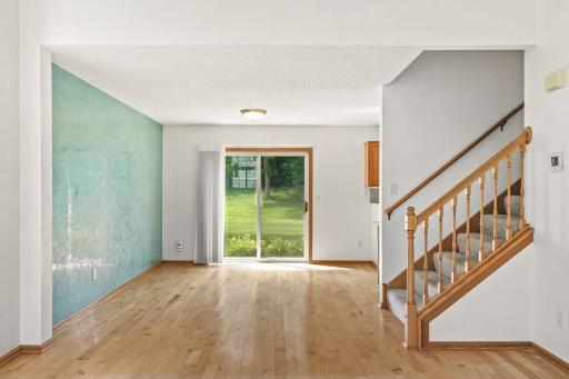 Spacious formal dining area with a sliding door that opens to a concrete patio to expand your entertaining outdoors.
