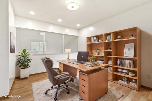 Virtually staged bedroom #3 that lends scale to the space and ideas for furniture placement.