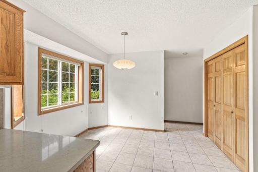 A convenient main floor laundry is located behind the bi-fold doors located just off the informal dining area.
