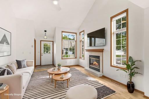 Virtually staged living room to bring scale to the room and ideas for furniture placement.