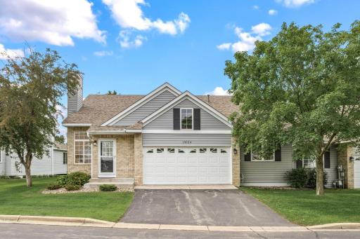 Photo for 13024 Garrett Lane, Saint Paul, MN 55124 - listing #7096960 Stunning end unit townhome that welcomes main level living with a primary bedroom suite and laundry on its main level.