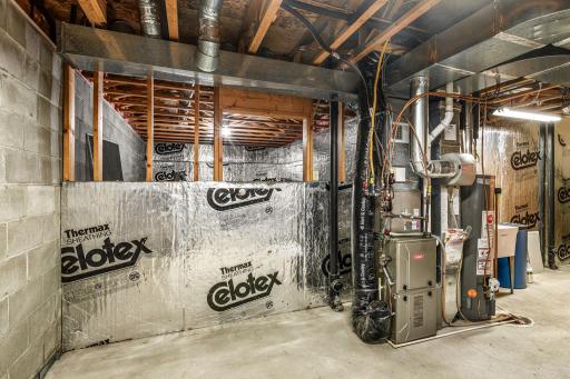 Raised open crawl space with lighting for additional storage and well maintained mechanicals.