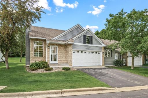 Lovingly maintained inside and out, this bright and spacious townhome lives like a single family home.