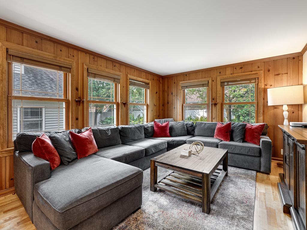 Versatile den provides a cozy retreat, home office, or additional living area—use it however you envision.