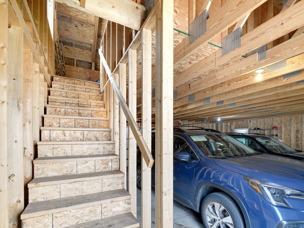 Additional versatility comes with an unfinished loft space easily accessed by stairs.