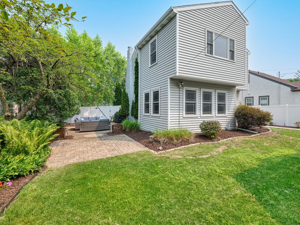 Usable flat yard space provides endless possibilities for recreation, gardening, and outdoor enjoyment.