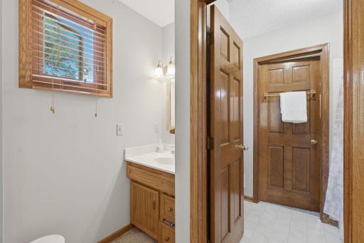 Jack and Jill bathrooms each have their own sinks with a full bath in the middle