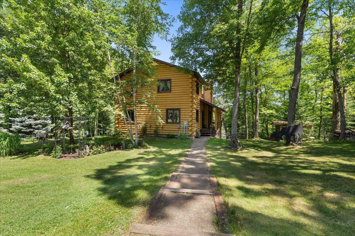 Walkway into this charming lake home!