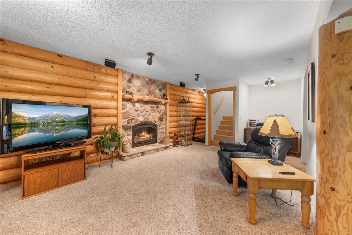 Lower level family room with gas fireplace