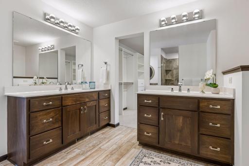 Two separate vanities so each has their own space.