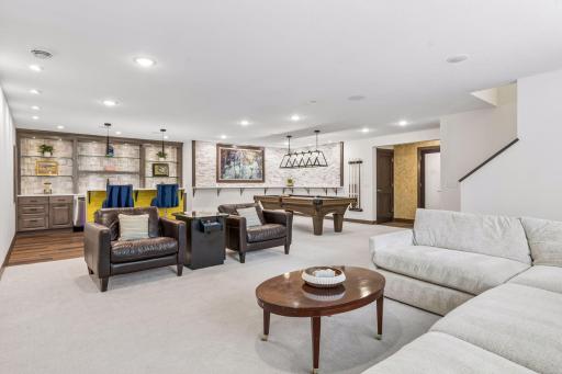 Lower level was finished in 2022, including a family room, wet bar, sauna, and fifth bedroom.