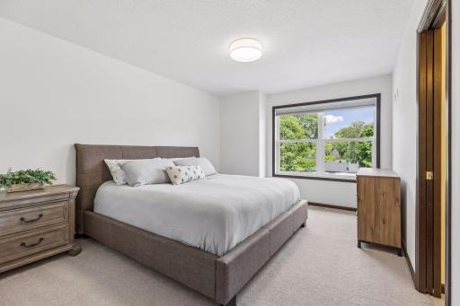 Second bedroom upstairs, with walk-in closet and access to the shared Hollywood style bath.