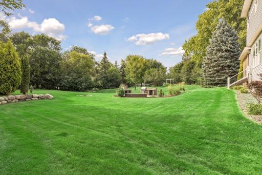 In-ground sprinkler system to keep grass and plants happy all summer long.