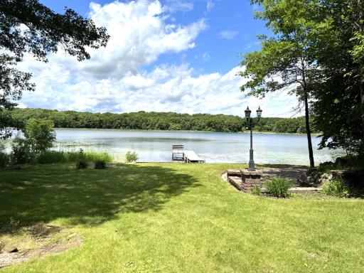Beautiful view of lake / dock / paver patio