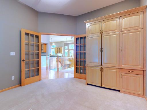 Main floor office w/ French doors - built-ins