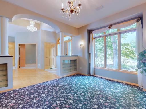 Formal dining - open to entry - glass display shelves