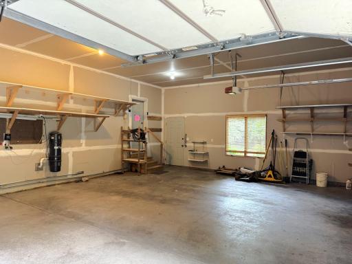 Attached garage - notice the windows / central vac unit