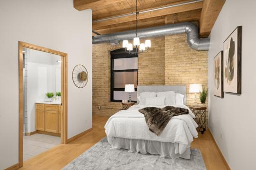 Primary suite features en suite bathroom and walk in closet