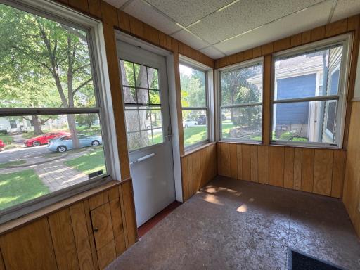 Notice the mailbox to the left of the door here.