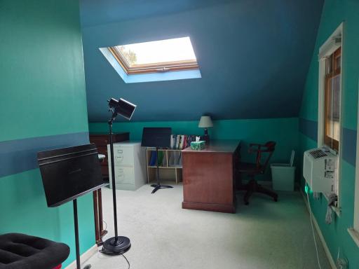 And a skylight! Very creative L-shaped space.