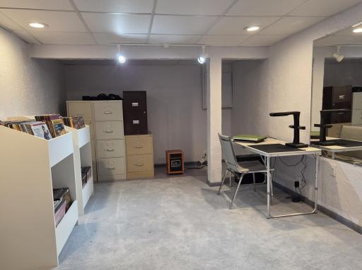 Just past the amusement room, is this family room (currently used as a studio). This is also sound-proof.