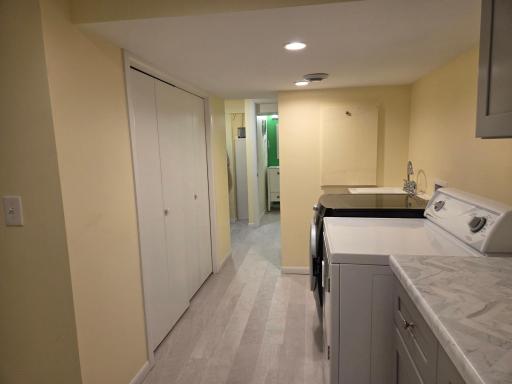 Closet with furnace & tankless water heater
