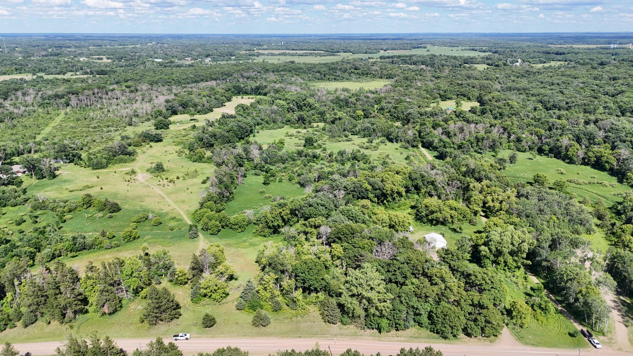 Aerial from road, facing East