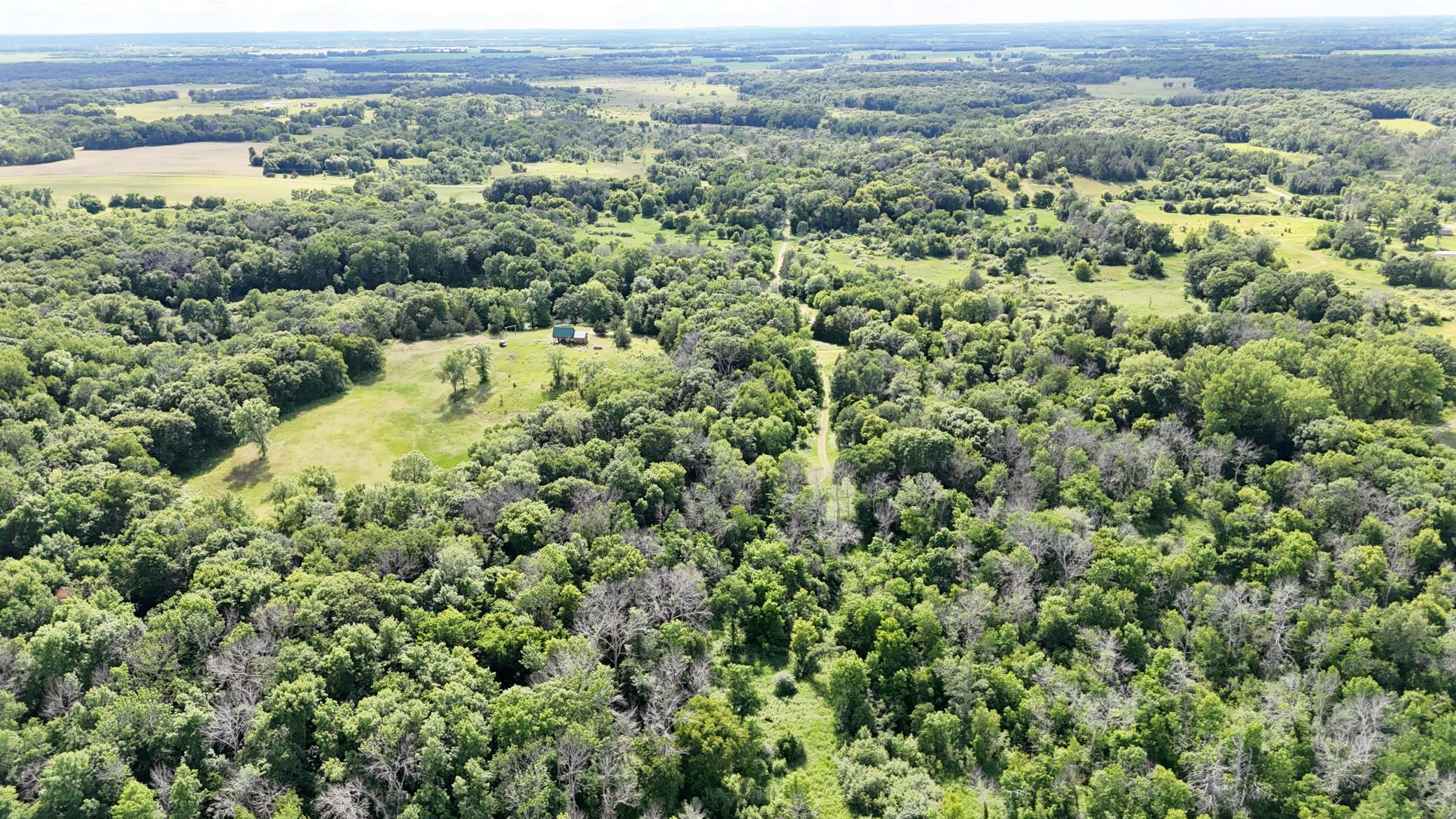 From the east, facing west. Main entrance in the distance(center)