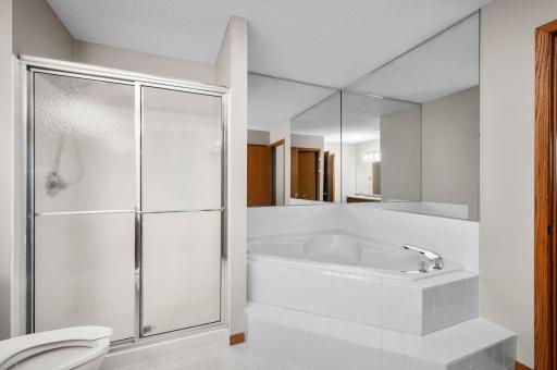 Upper level full bath, w/ pass through door to primary