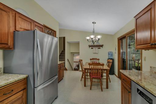 alternate view of kitchen and dining