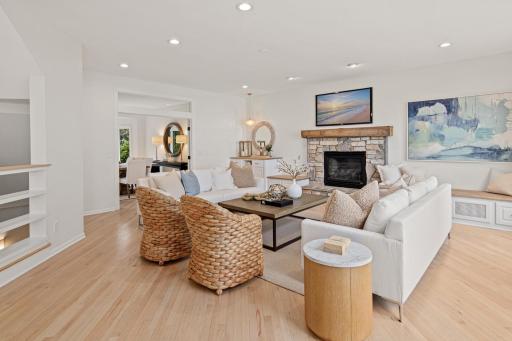The great room flows easily into the formal dining room. The perfect place to host small and large parties.