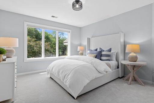 Each of the three upper-level bedrooms offers exceptional space, abundant natural light, and picturesque views. Fresh paint, luxurious new cut-and-loop carpeting, and updated designer light fixtures make this space move-in ready.