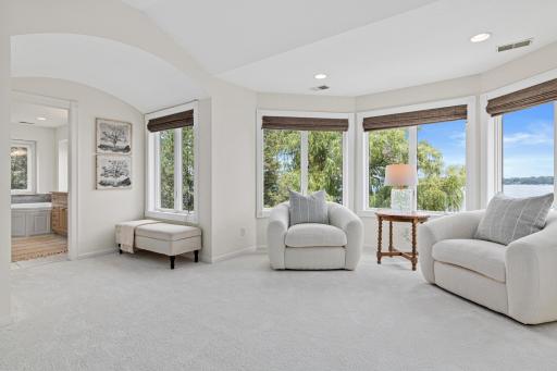 Large windows invite nature inside while creating a peaceful place to begin and end each day.