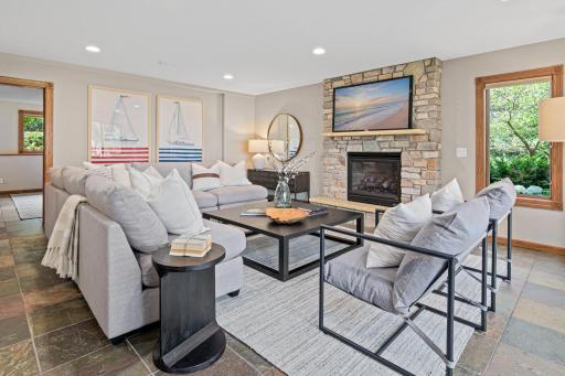 An inviting space for movie nights, game days, and gathering with family and friends. The lower level is a destination year-round.