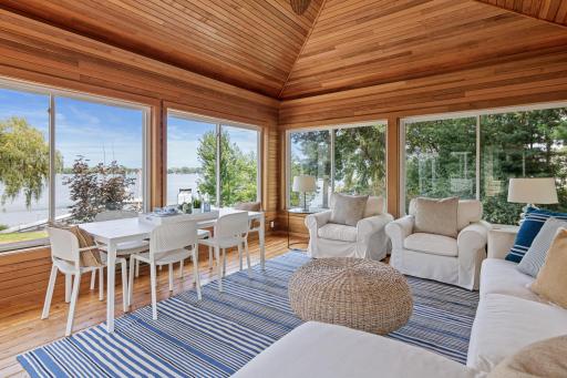 Filled with natural light, this peaceful space offers year-round enjoyment of the surrounding landscape.