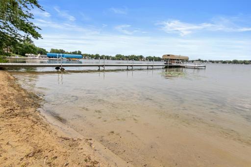 Exceptionally flat, sandy beach- perfect for building sandcastles, playing volleyball and more. Rare level shoreline provides easy lake access and endless recreational opportunities.